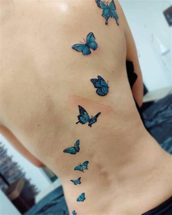 Back Blue Butterfly Tattoos no_limit.tattoo