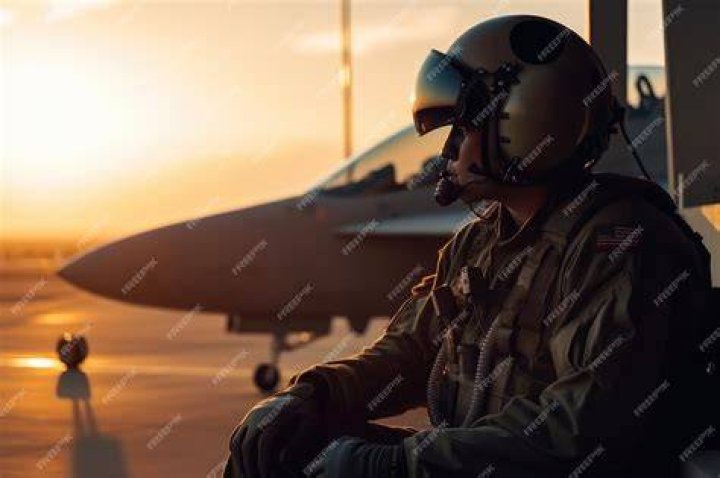 Bomber pilot sitting in plane