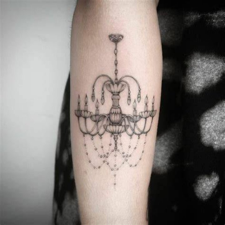 Chandelier tattoo on Bryan Fn Vega shoulder