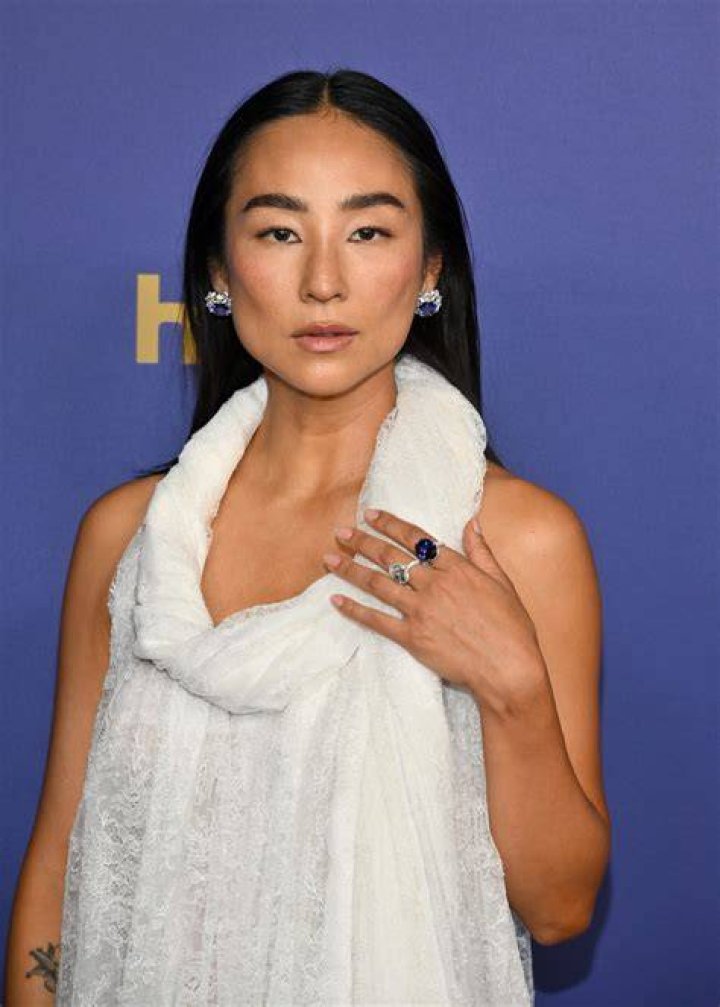 Greta Lee Greta Lee in a white and black dress