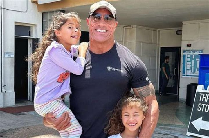John Krasinski, Dwayne Johnson, and Blake Lively looking awkward