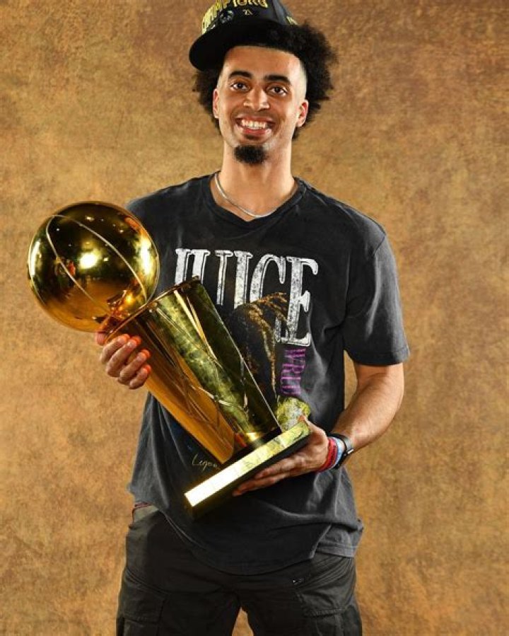 Jordan Nwora With NBA Trophy