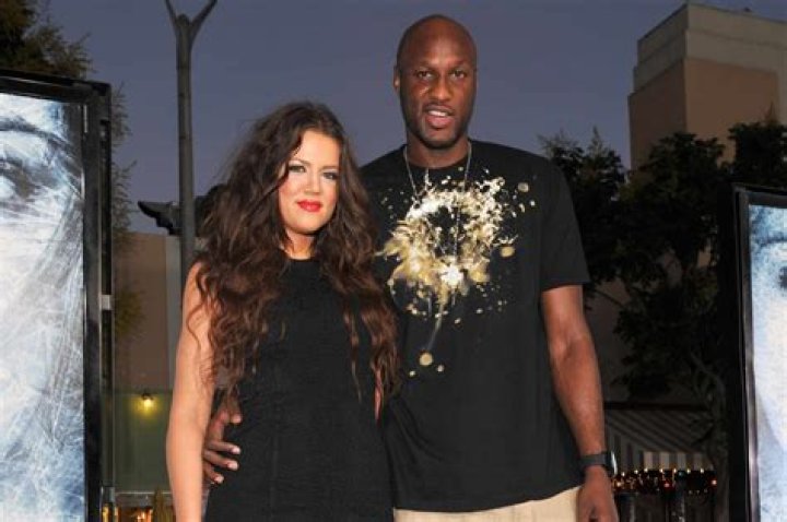 Khloe Kardashian and Lamar Odom in their wedding dress during the ceremony