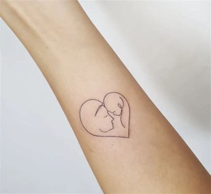 Mother and heart tattoo