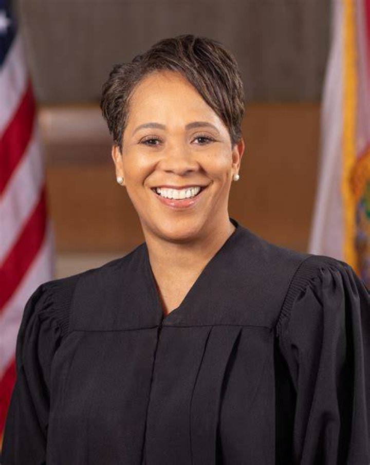 Motto selected as district associate judge