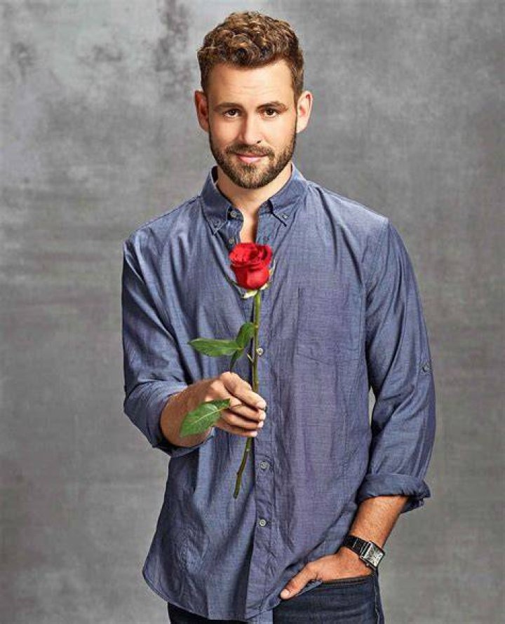 Nick Viall from The Bachelor holding a rose