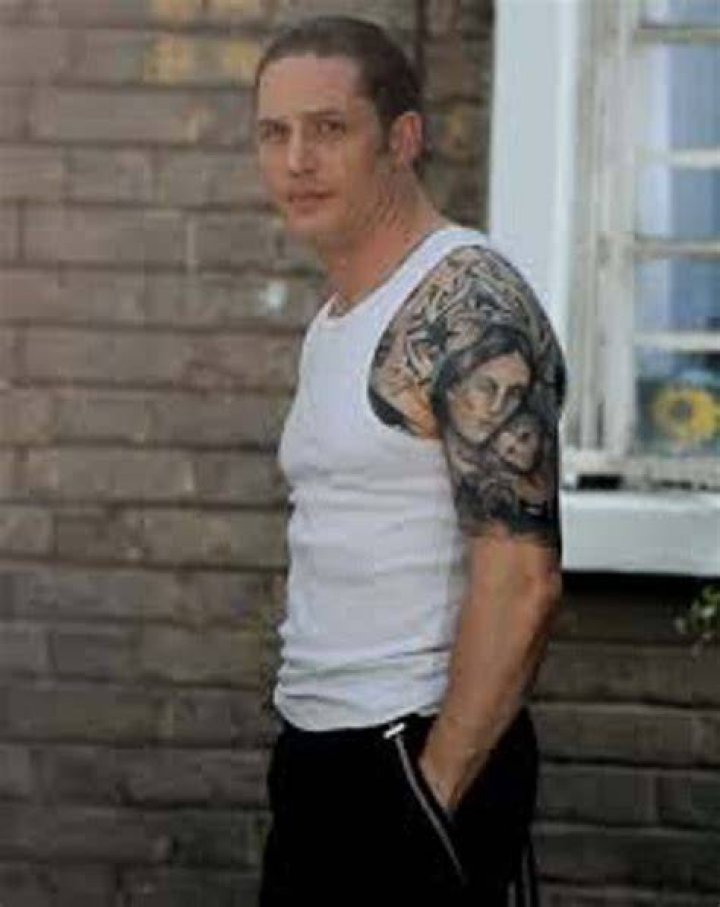 tom hardy madonna cradling baby tattoo