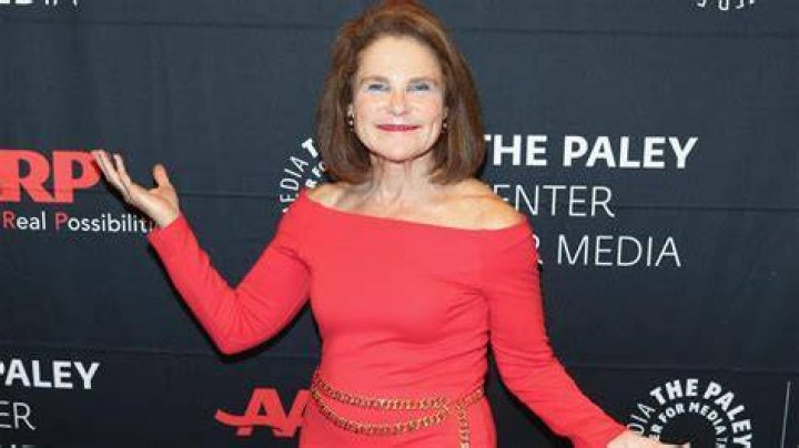 A Man Called Otto Tovah Feldshuh on the red carpet for A Man Called Otto, wearing a red coat