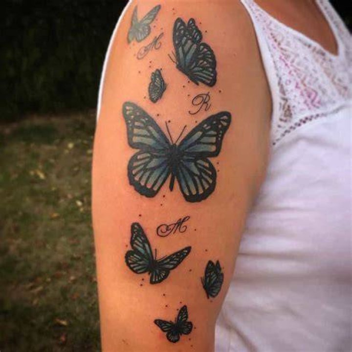 Upperarm Blue Butterfly Tattoos calcifrr